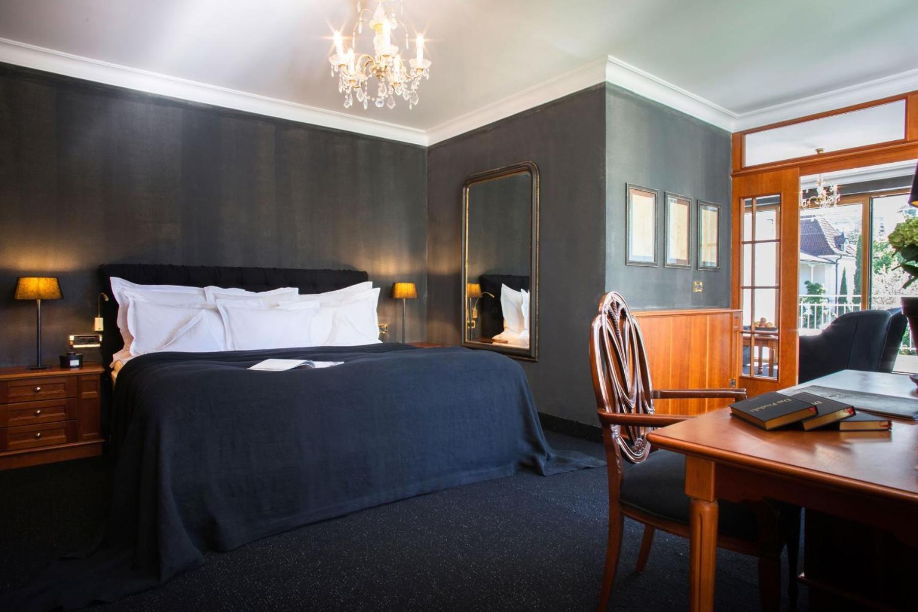Suite mit Kingsize-Bett und Balkon